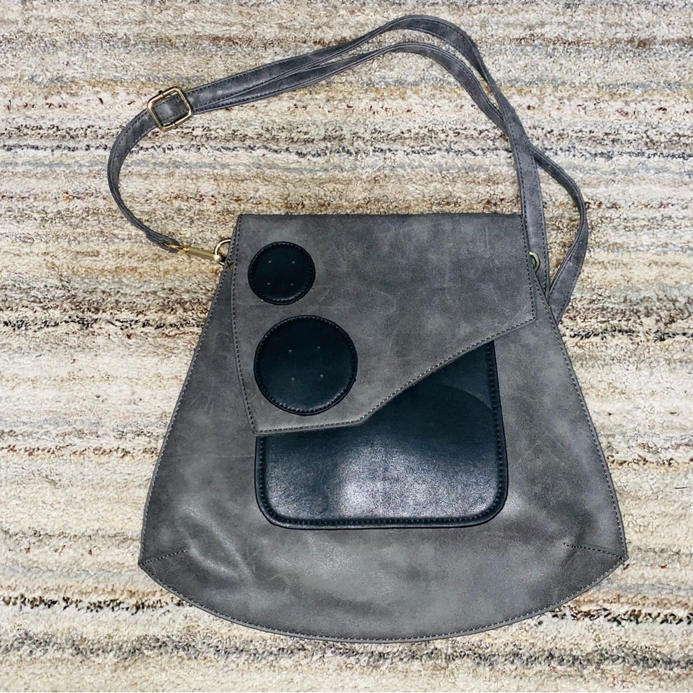 Unk Gray Crossbody Bag with Black Circle Accents